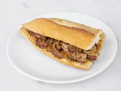 Yarım Ekmek Arası İzmir Usulü Kuyu Kuzu Kokoreç